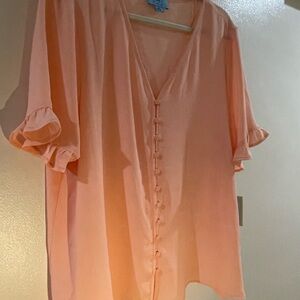 NWT blouse from CeCe. Gorgeous light peach color. Short sleeves and V neck.